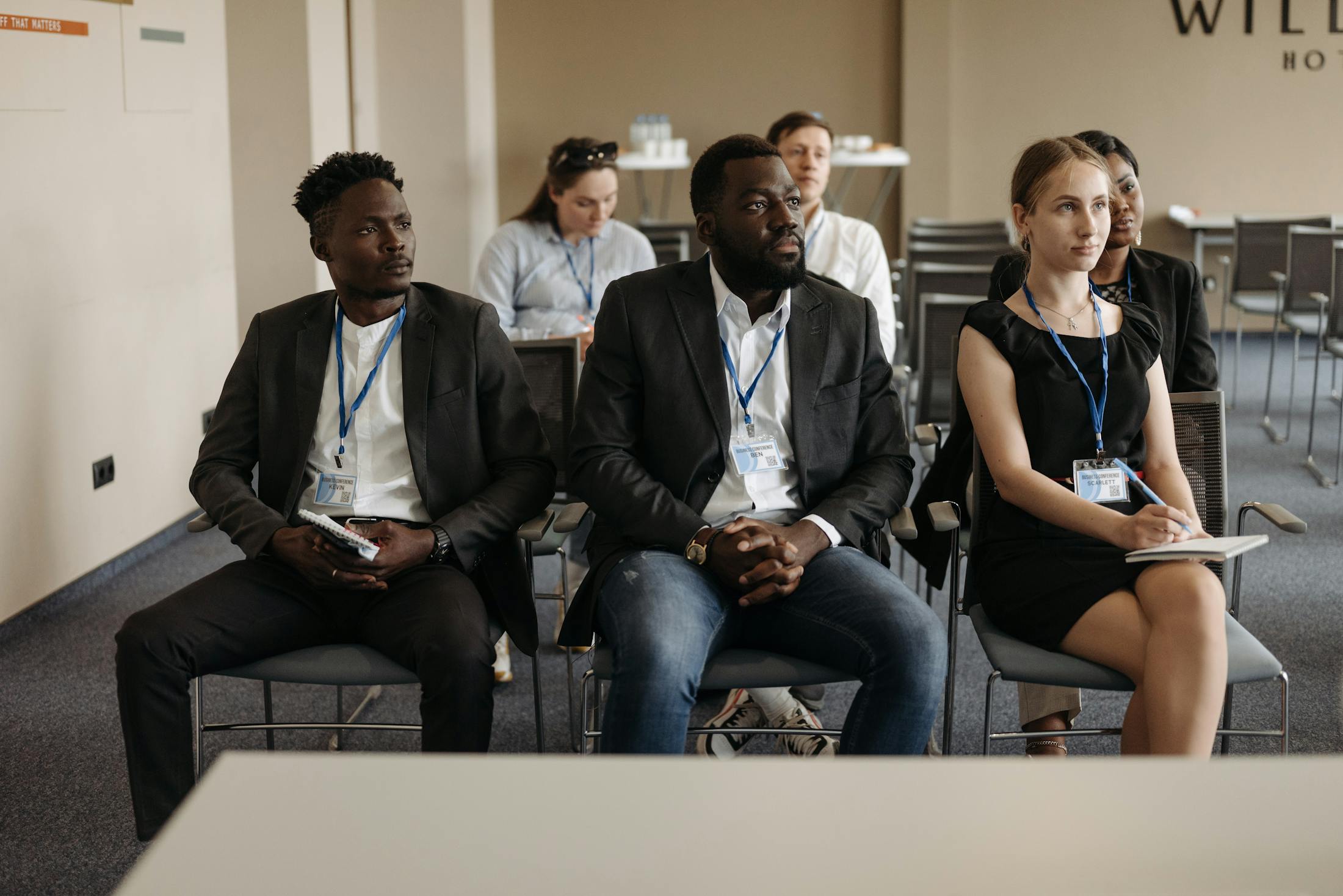 Mixed professional audience listening during a training seminar
